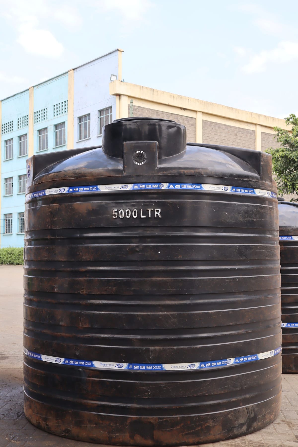 A 5,000 litre Jumbo Tank with the capacity moulded into the wall and the inlet cover on the domed top.